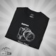 14127623996029659415_2048_custom.jpeg Shutter Swag Designs 50mm Camera Lens T-Shirt, black folded closeup