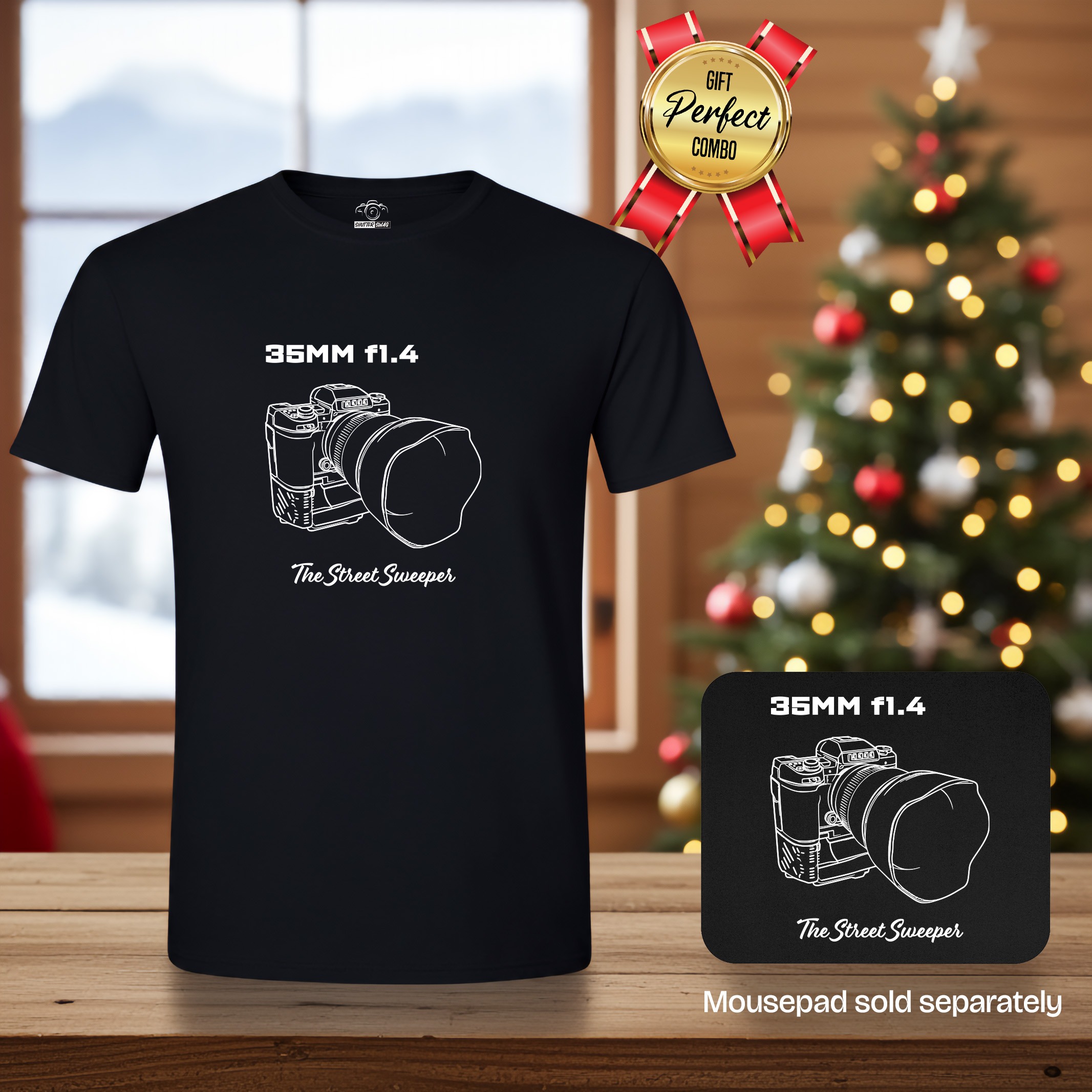 Black t-shirt and mousepad, both with white technical line drawing of a camera with 35mm f1.4 lens, text '35MM f1.4' above and 'The Street Sweeper' below. This perfect gift combo is on wood table with Christmas tree behind.